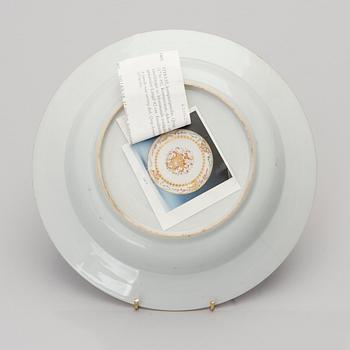 A CHINESE SOUP PLATE, amorial procelain. Qing dynasty, Qianlong (1736-95).