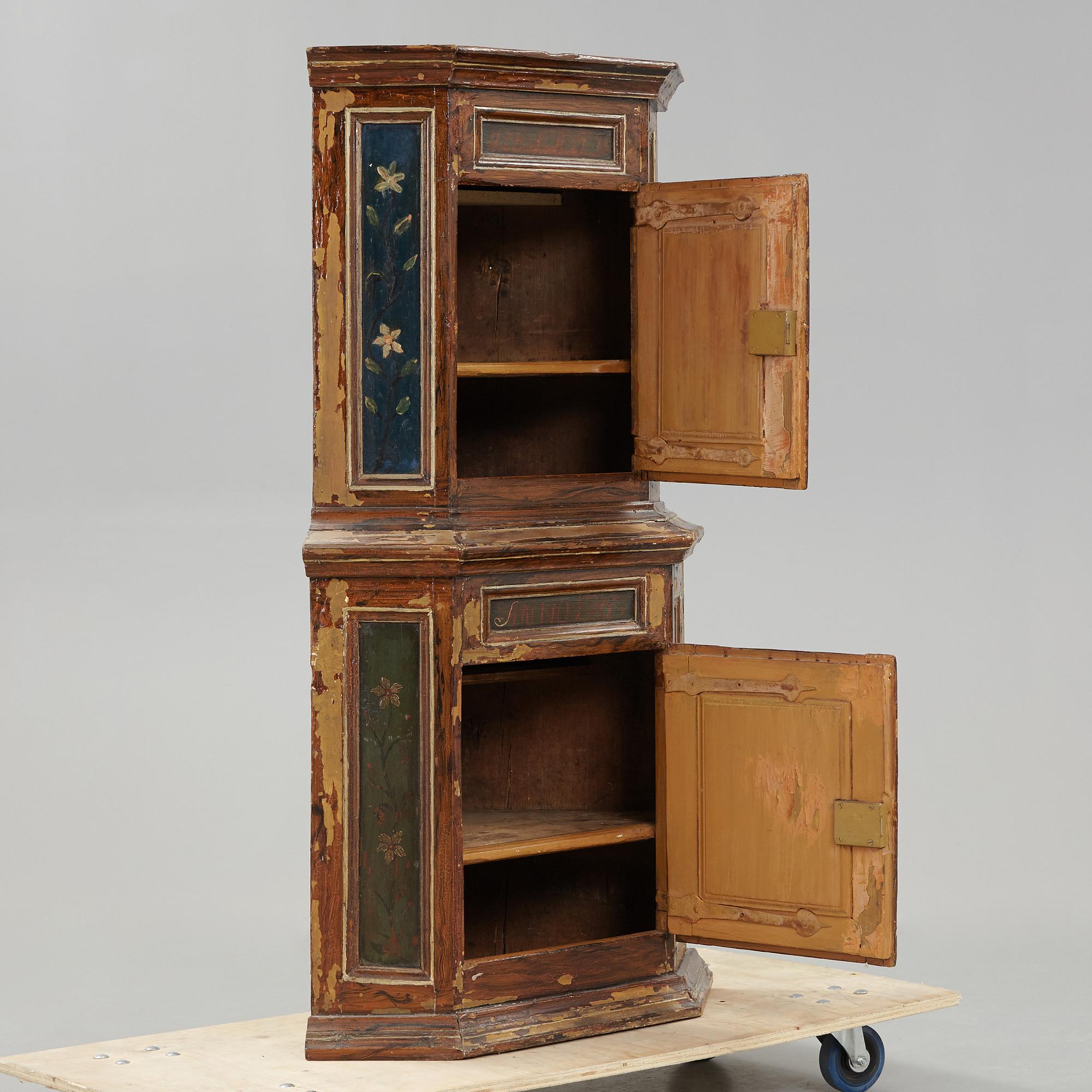 A 18th century corner cabinet.