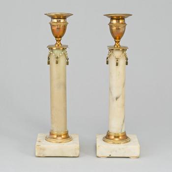 A pair of late gustavian  candlesticks, ca 1800.