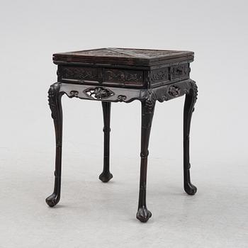 A Chinese hardwood games table, around the year 1900.