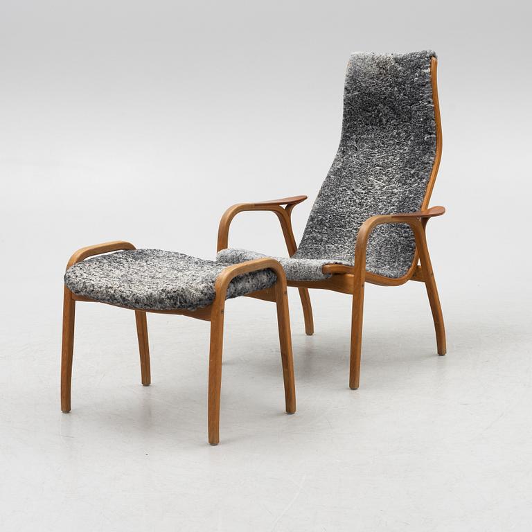 Yngve Ekström, an armchair and a footstool "Lamino", anniversary edition, Swedese.