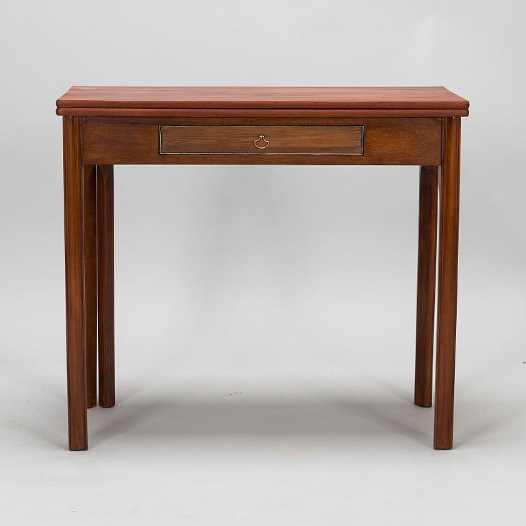 An 19th century game table England.