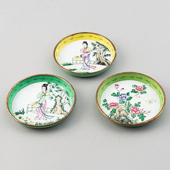 A set of 23 enamel on copper dishes, China, early 20th Century.