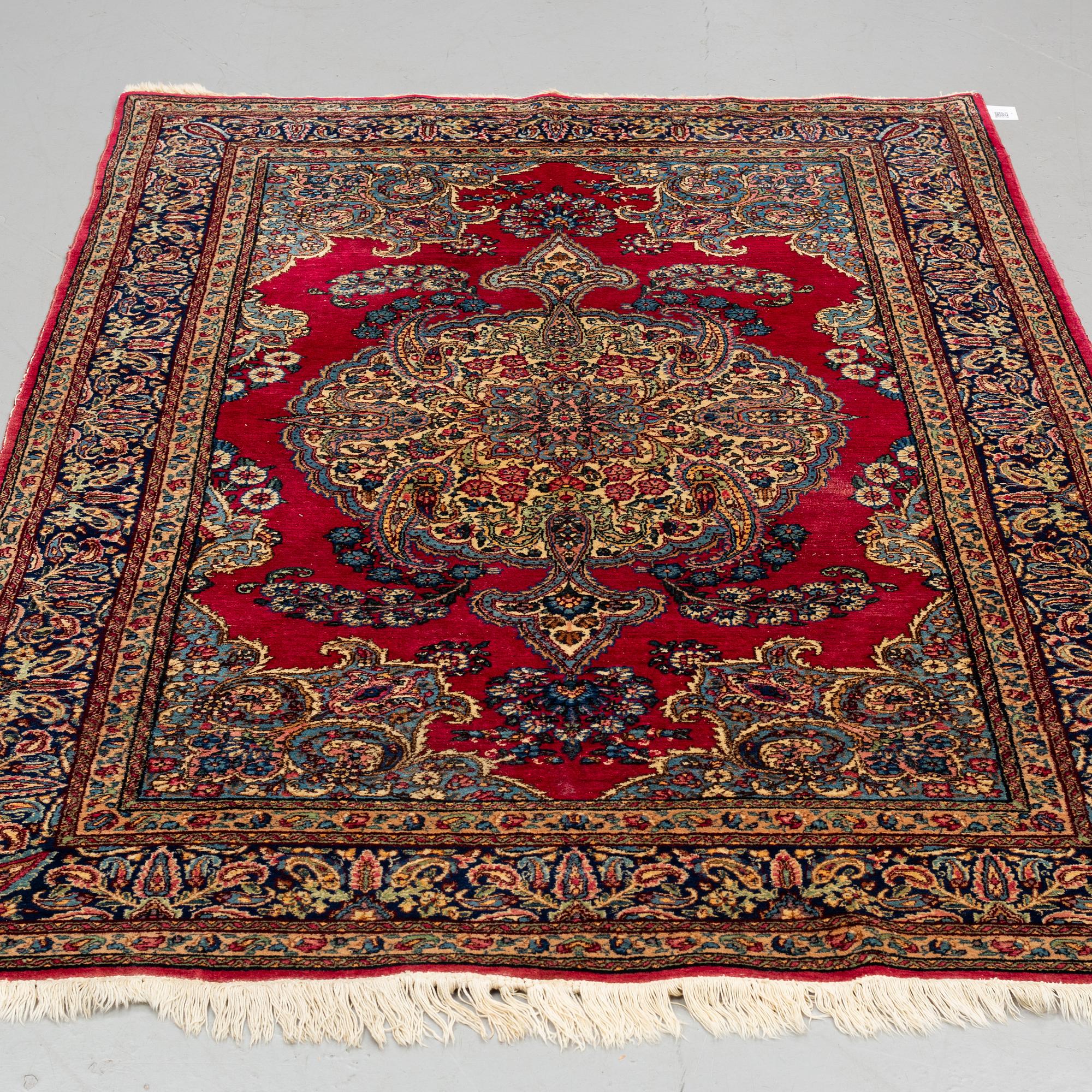 MATTO, a semi-antique Kerman, ca 220,5 x 139,5-142,5 cm.