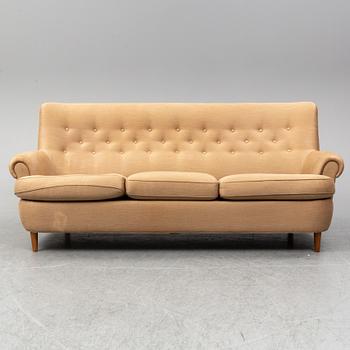 A 'Hemmakväll' sofa by Carl Malmsten.