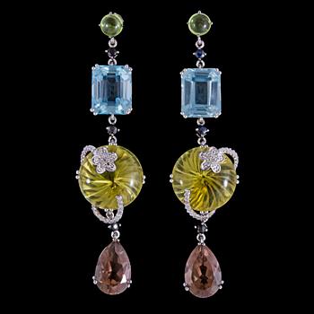 1127. A pair of aquamaringe and citrine earrings.