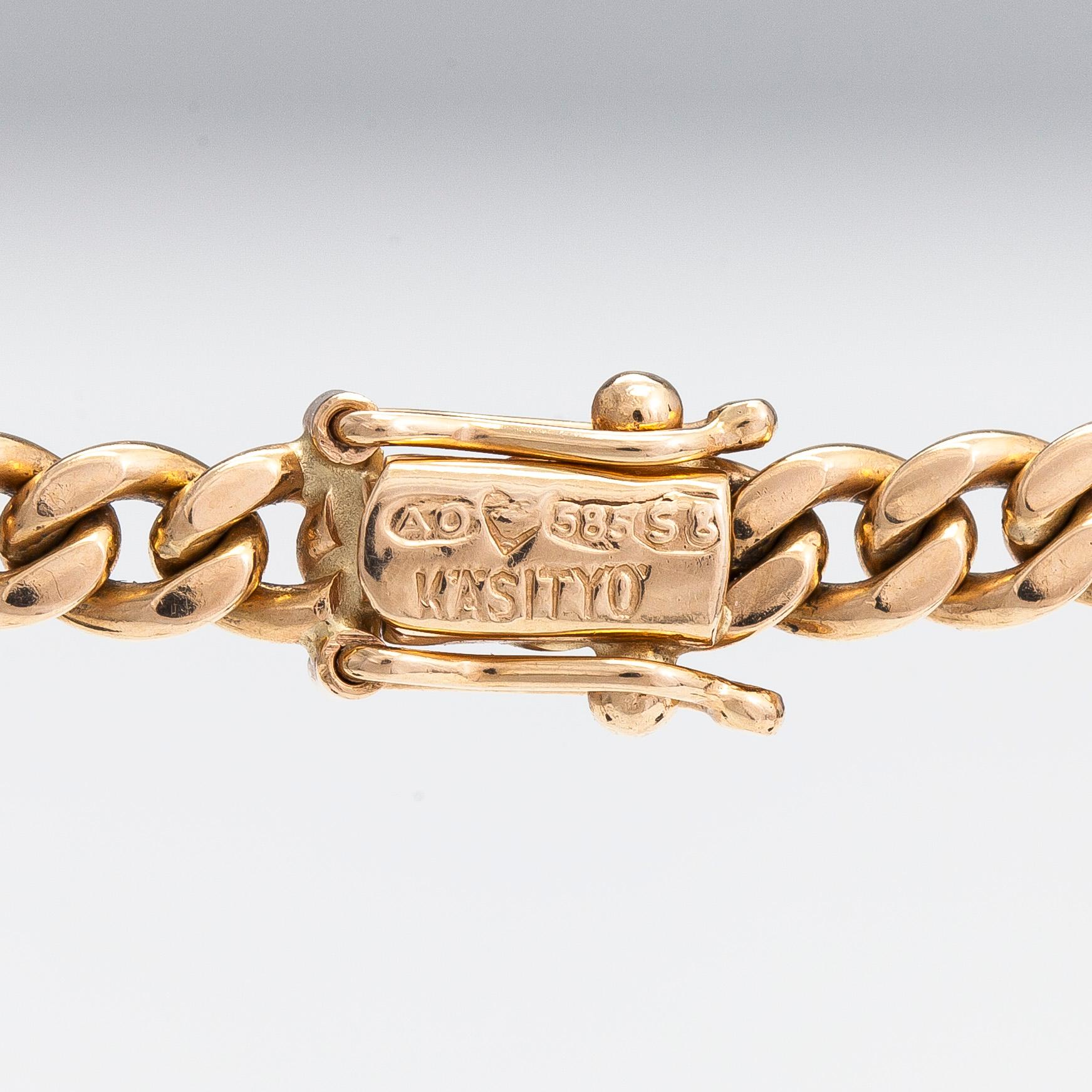 Necklace, cross, 18K/14K gold with diamonds totaling approx. 0.55 ct, Finland 1971/2007.