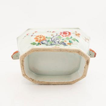 A Chinese famille rose tureen with cover and plate later part of the 18th century.