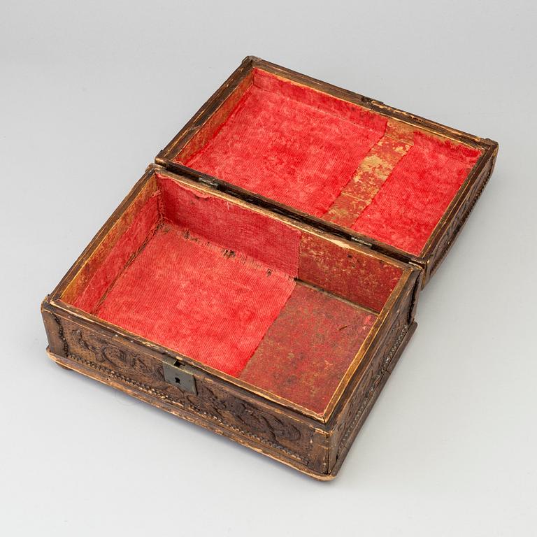 An 18th century wooden box.