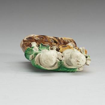A figure of 'laughing boys', Qing dynasty, 18th Century.