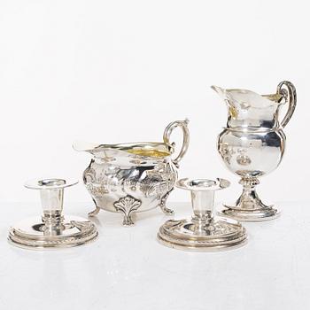 Two jugs and a pair of candlesticks, CG Hallberg among others.