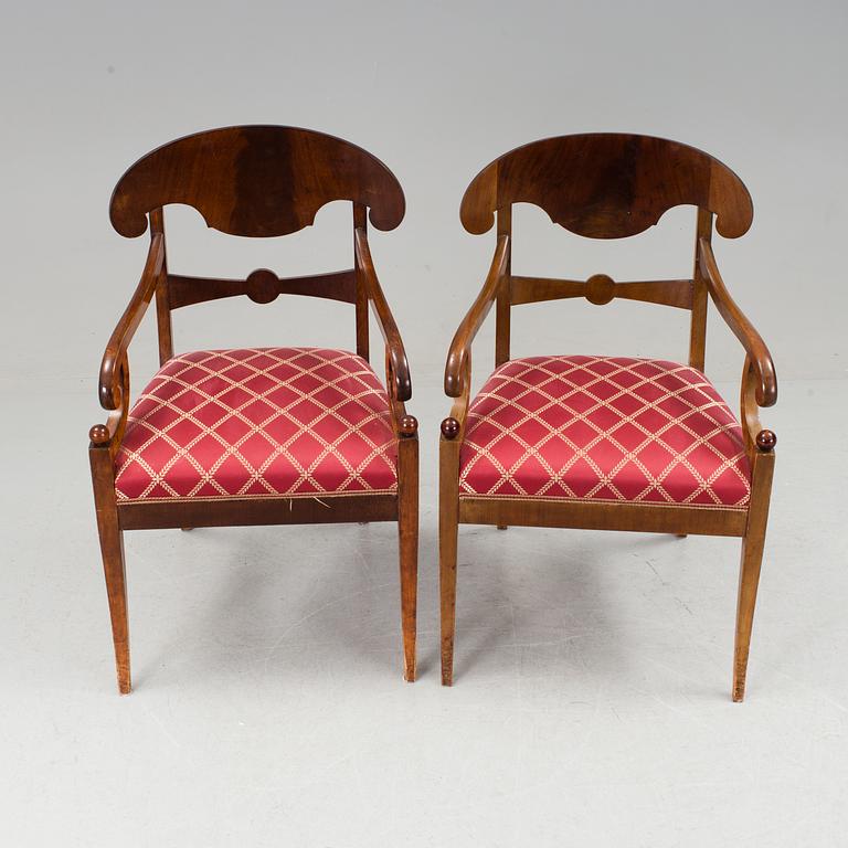 A pair of Karl Johan mahogany armchairs first half of the 19th century.