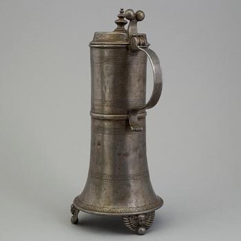 A PEWTER MUG, dated 1776.