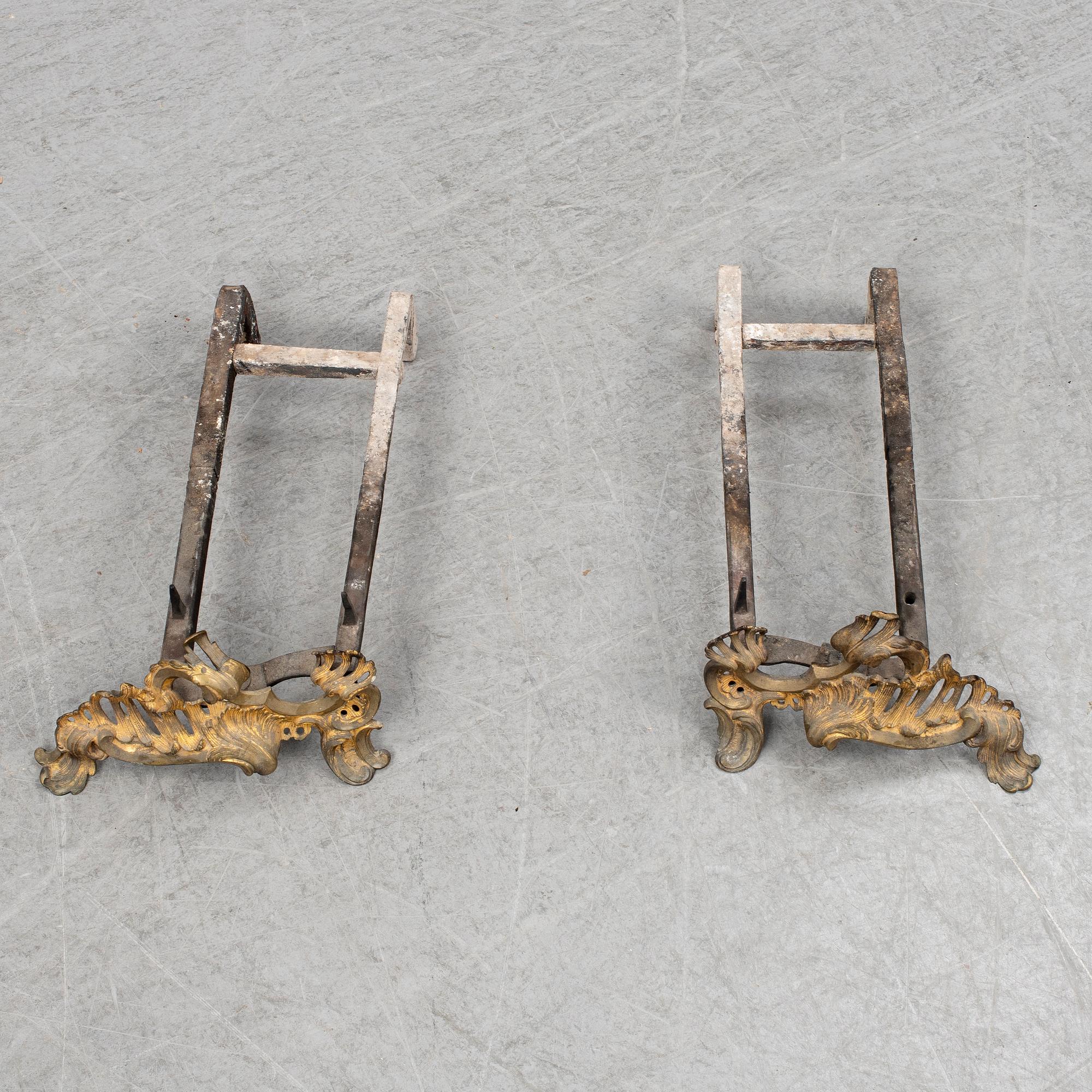 A pair of 19th century Louis XV-style andirons.