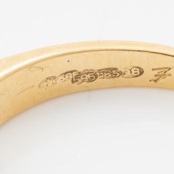 14K gold ring with princess-cut diamonds.