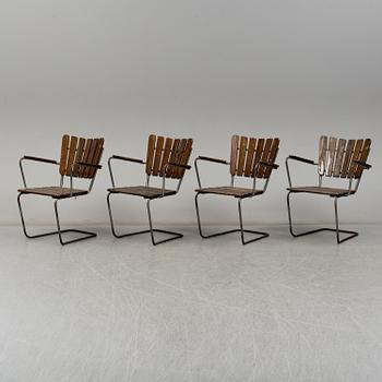 Four tubular steel and pine garden chairs, mid 20th Century.