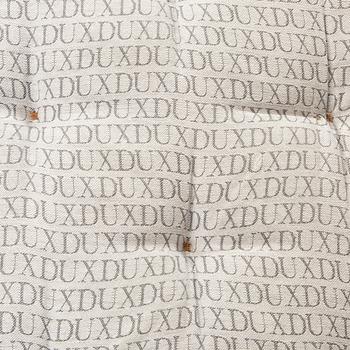 A Bruno Mathsson "Pernilla" leather easy chair for DUX later part of the 20th century.