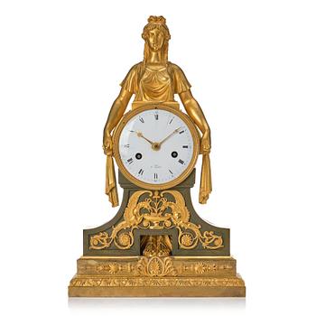 An Empire bronze mantle clock.