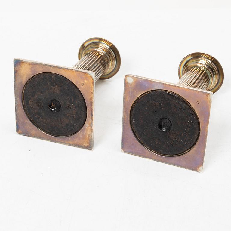 Hawksworth, Eyre & Co Ltd, a pair of silver candlesticks, Sheffield 1890.