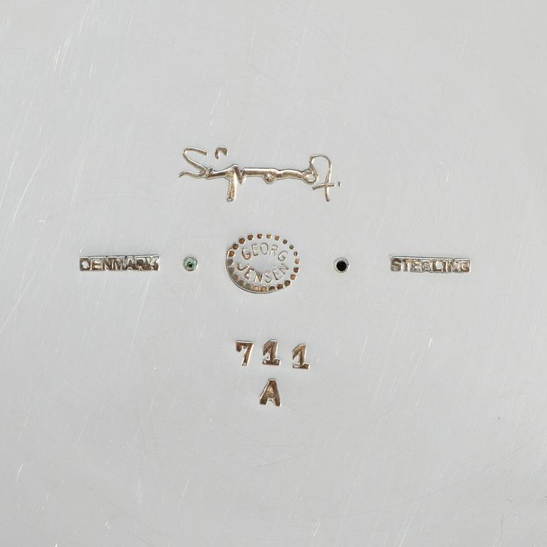 A pair of sterling Sigvard Bernadotte candlesticks.