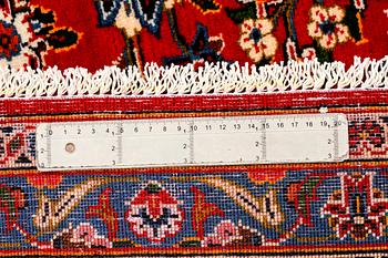A Keshan rug, signed, 410 x 295 cm.
