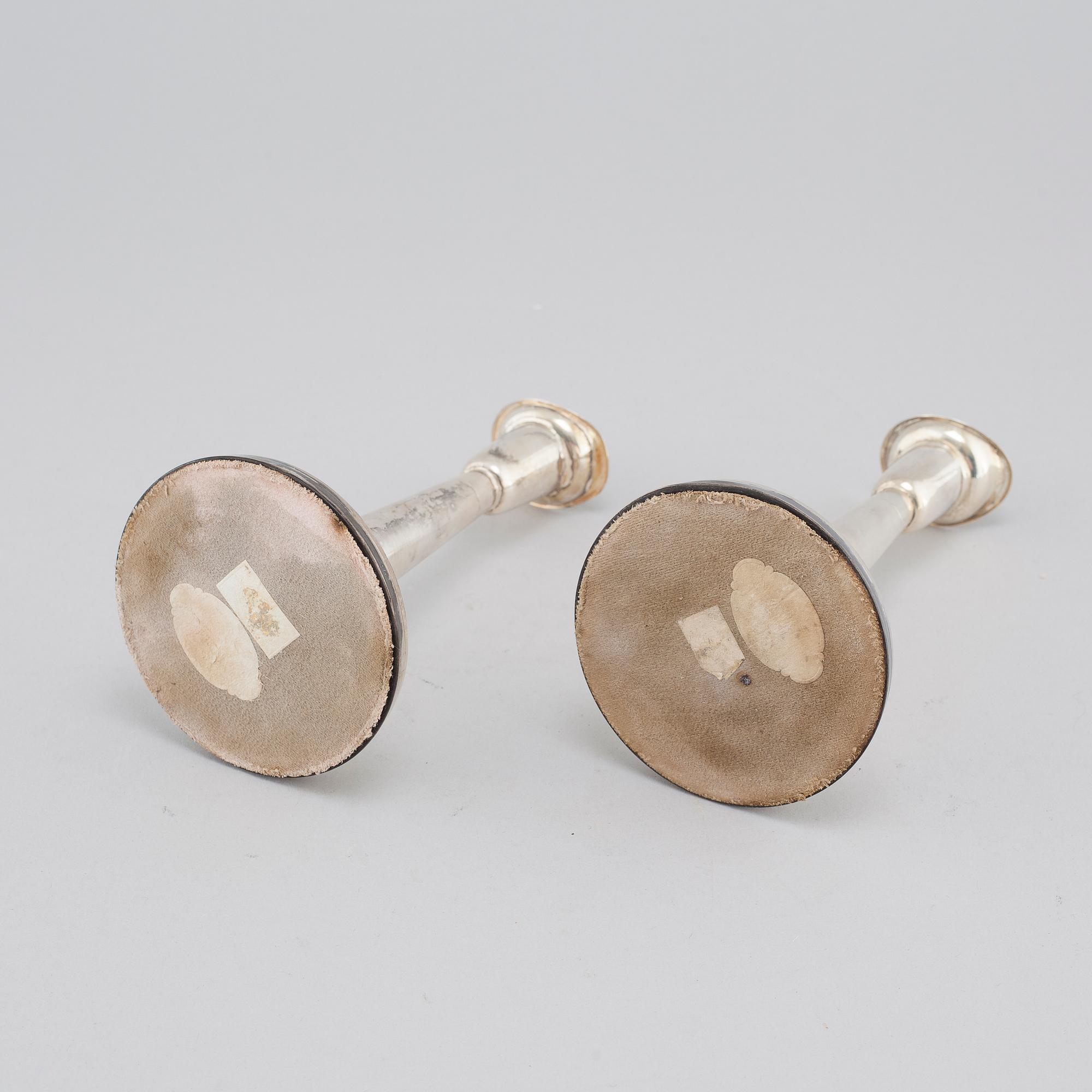 A pair of silver candle sticks by Tore Eld in gothenburg, Sweden, 1959.