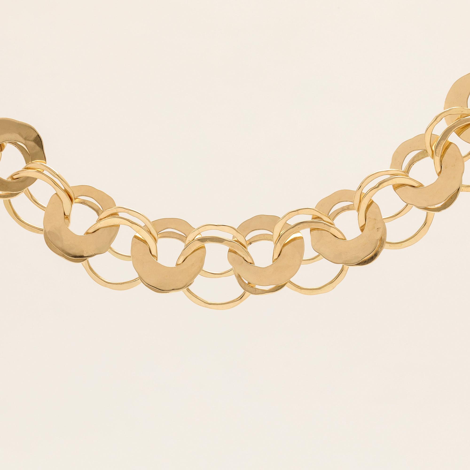 An 18K gold necklace by Cusi Italy.