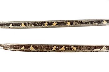 A set of three Burmese 'Dha' swords, late 19th /early 20th Century.