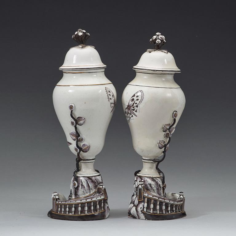 A pair of Swedish faience vases with covers, Marieberg, 18th Century.