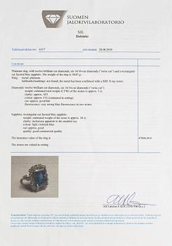 A platinum ring with a ca. 18.00 ct sapphire and ca. 3.00 cts of diamonds. With certificates.