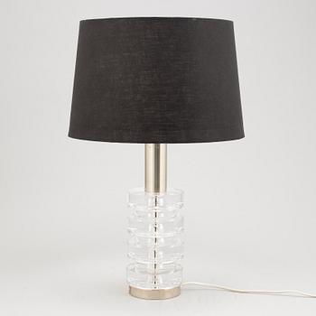 Carl Fagerlund, a glass and metal table lamp, Orrefors, second half of the 20th century.