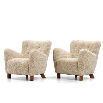 370. Fritz Hansen, a pair of easy chairs model "1669", Denmark, 1940s.