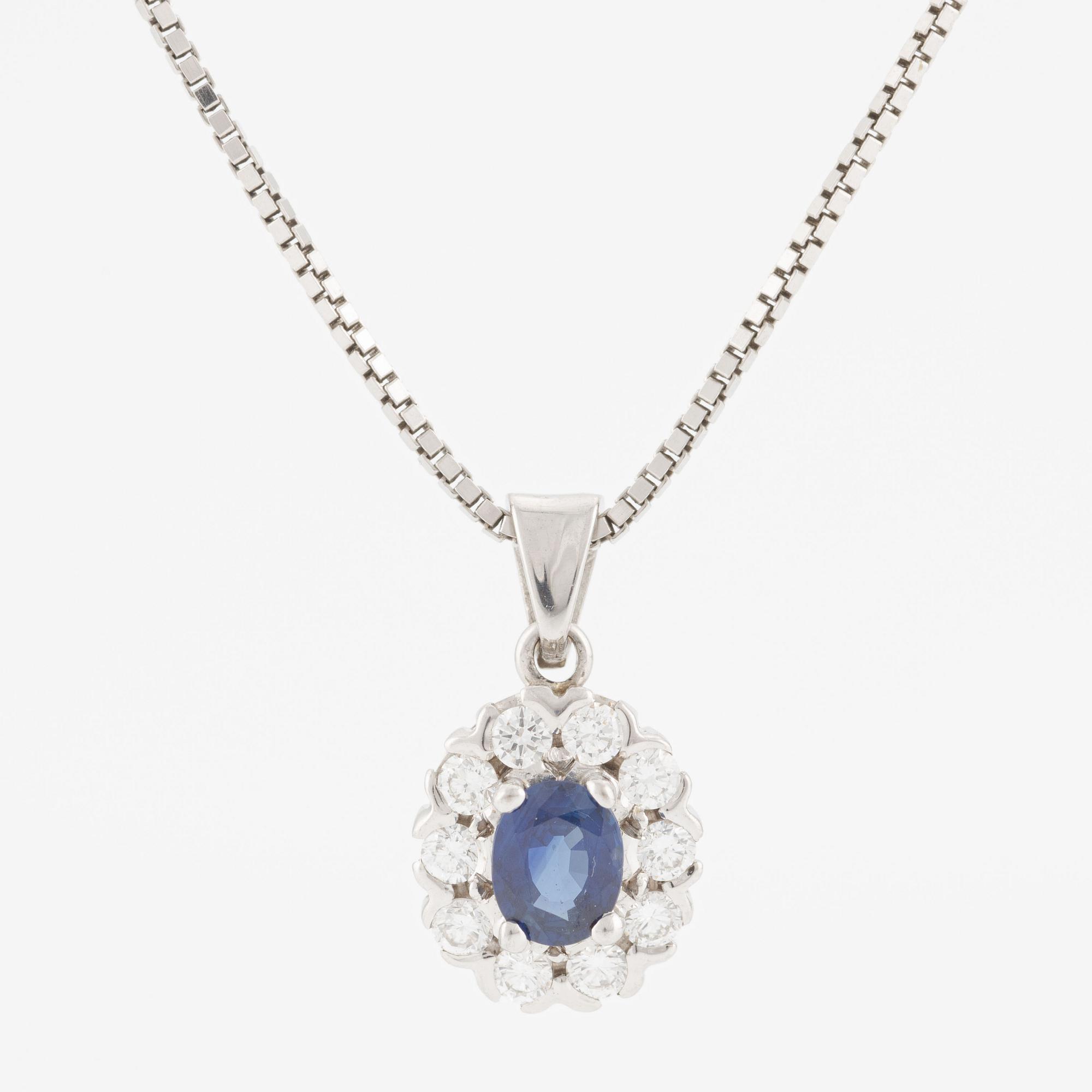 Hänge med kedja 18K guld med en safir och runda briljantslipade diamanter.