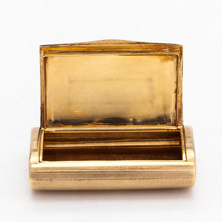 A 14K gold box.