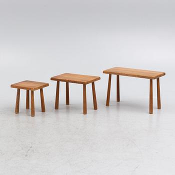 A set of three nesting oak tables or stools. second paert of the 20th century.