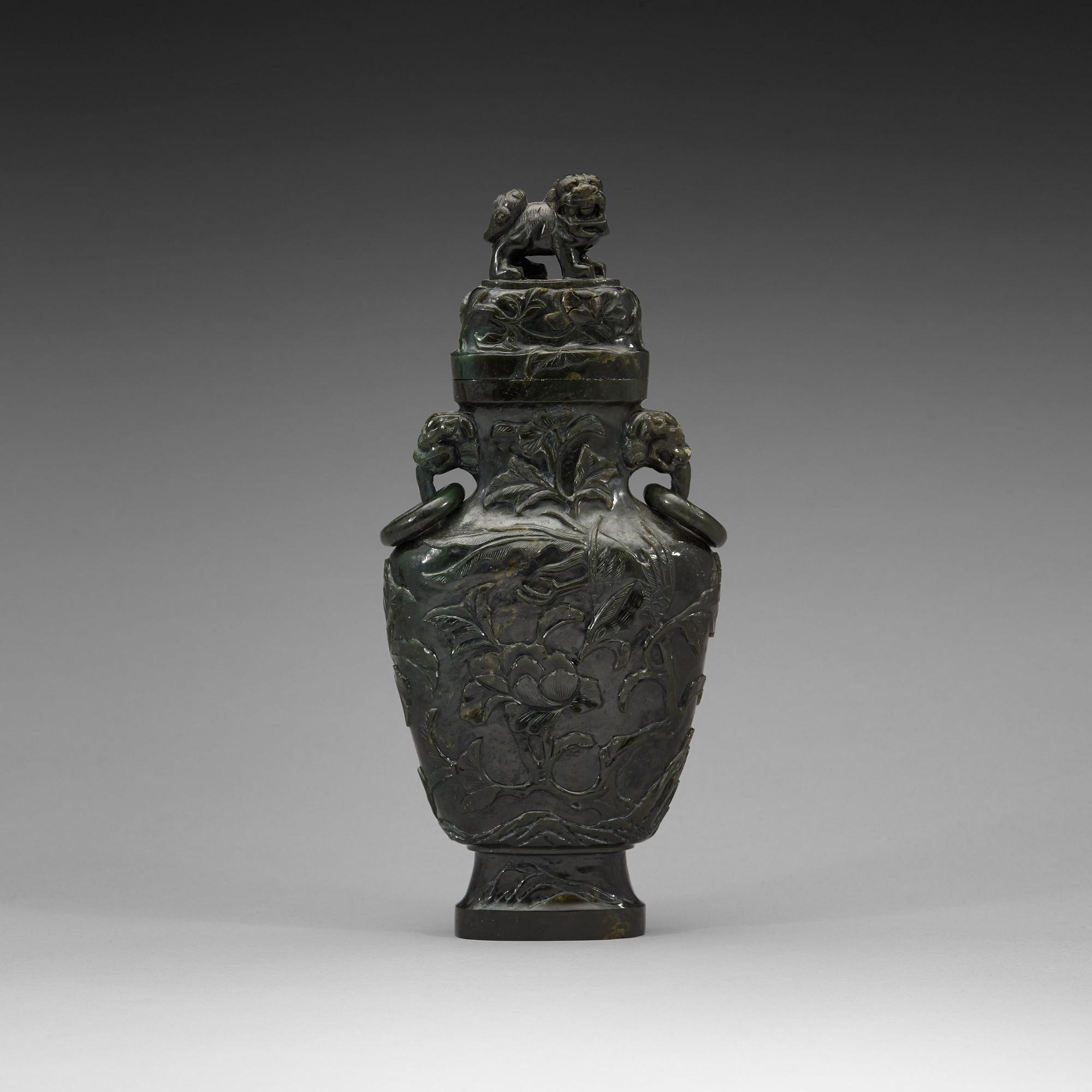 A Chinese carved stone vase, 20th Century.