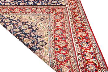 A Kashan carpet, a. 365 x 257 cm.