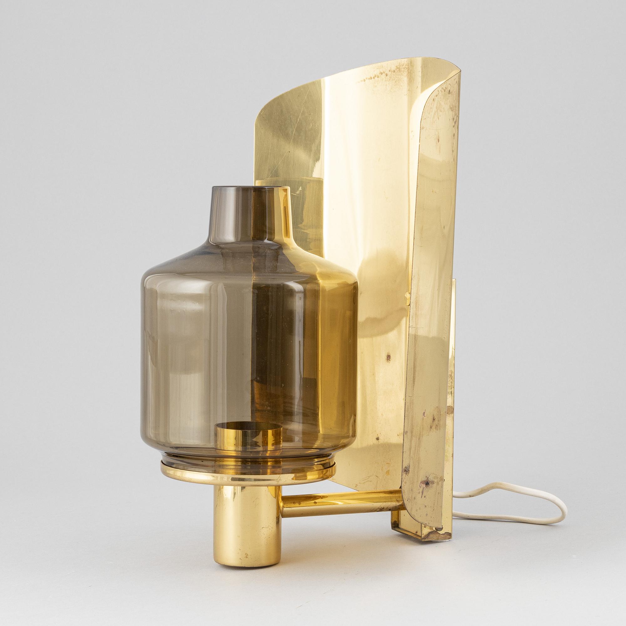 Hans-Agne Jakobsson, three brass wall light sconces, Markaryd, 1960's.