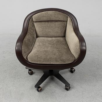 An contemporary 'Vittoria' office chair by Romeo Sozzi for Promemoria furniture.
