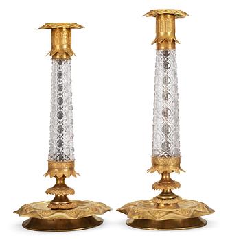 8. Two similar Russian 1830's gilt brass and glass candlesticks.