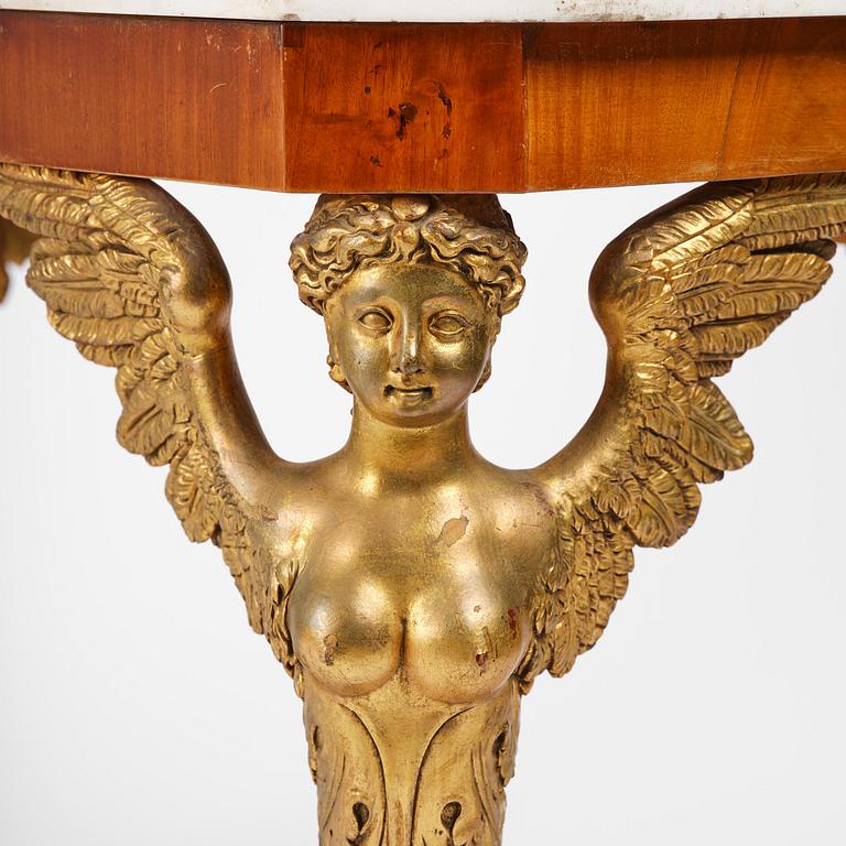 A presumably Austrian Empire centre table, early 19th century.