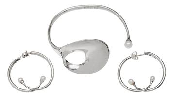 634. A Torun Bülow Hübe sterling bangle and a pair of earrings, Georg Jensen, Copenhagen post 1945.