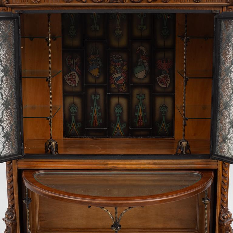 A Baroque style drinks cabinet, first half of the 20th Century.