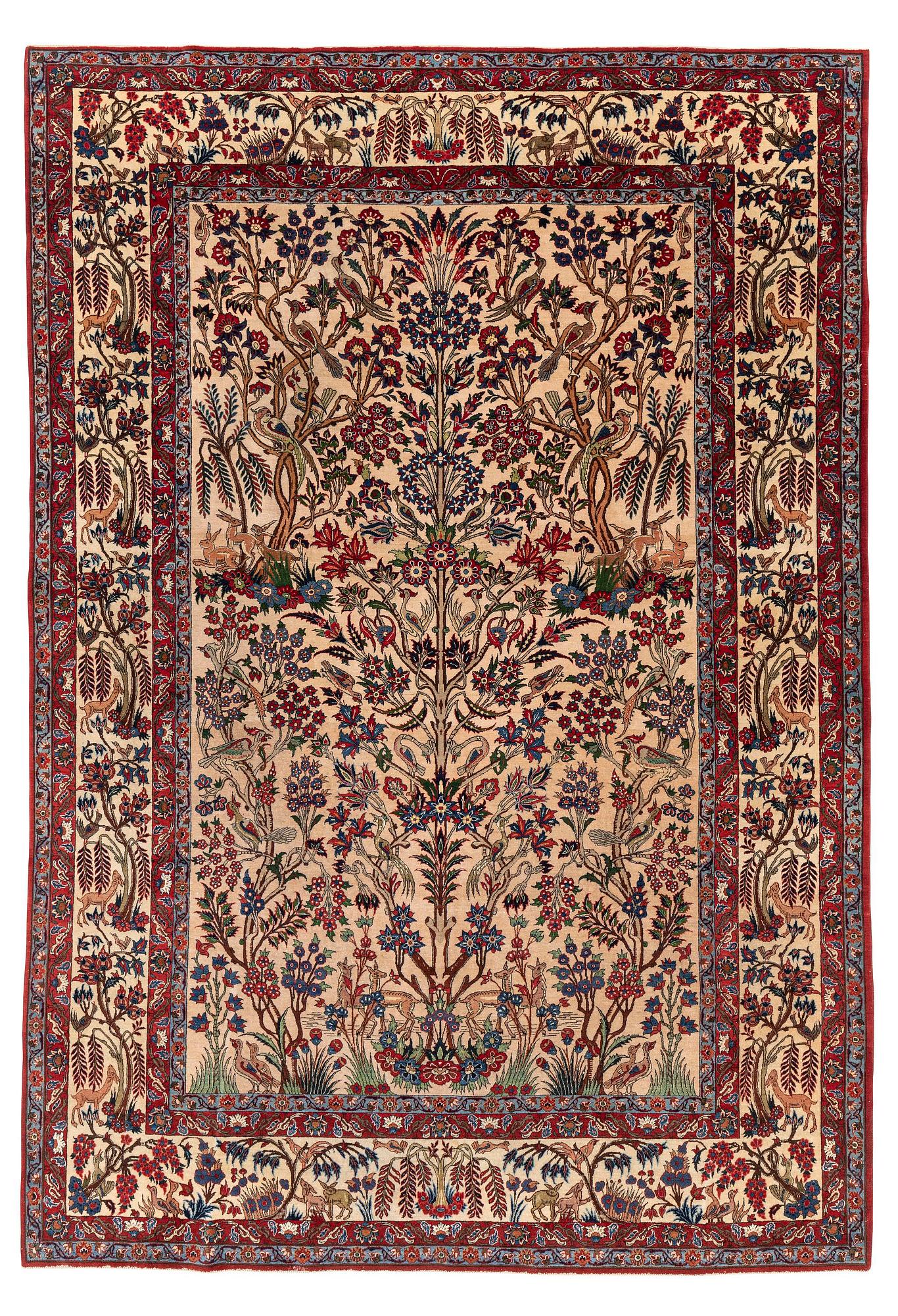 A semi-antique Qum carpet, Central Persia, c. 312 x 215 cm.