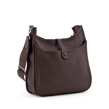 HERMÈS, a taurillon clemence chocolat shoulder bag, "Evelyn III / GM".