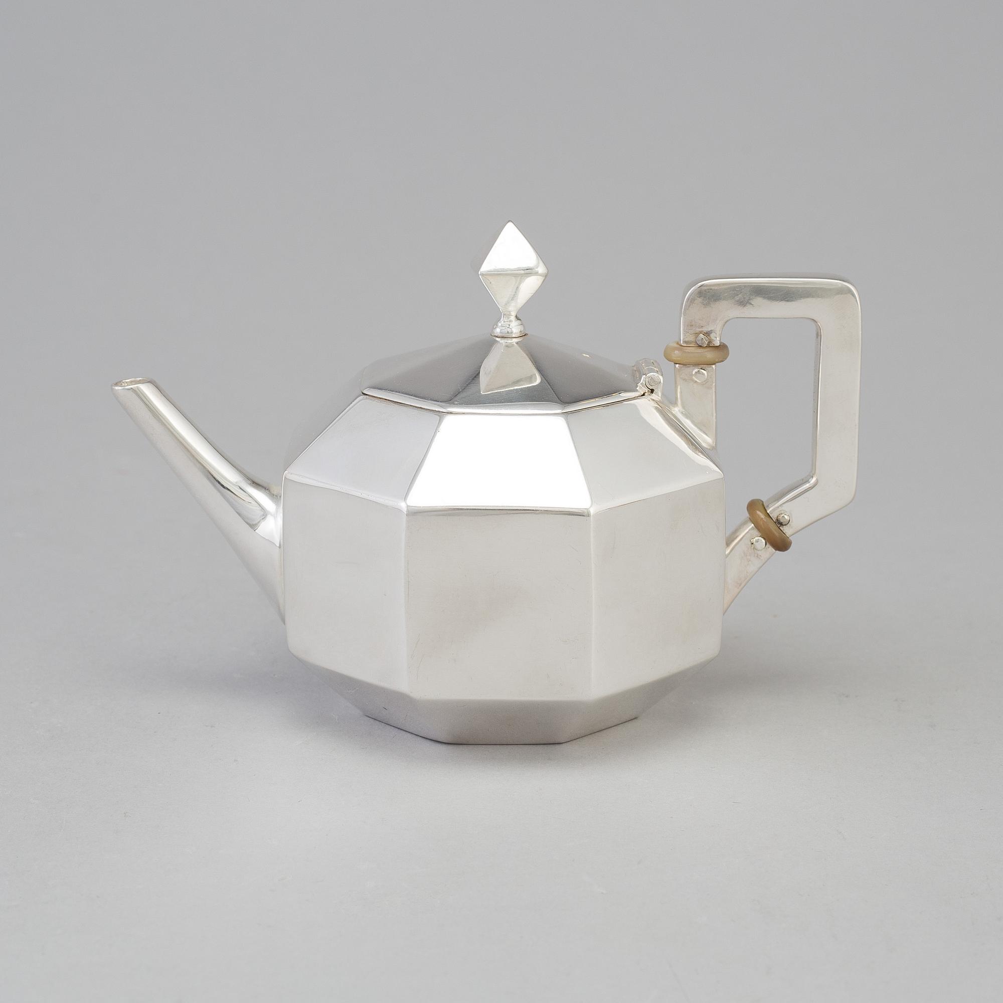 A Swedish octagonal shape small silver teapot, maker's mark K Anderson, Stockholm 1898.