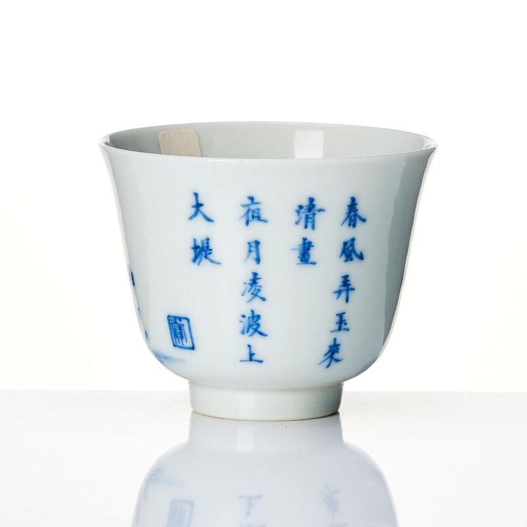 A blue and white month cup 'Narcissus', late Qing dynasty with Kangxi mark.