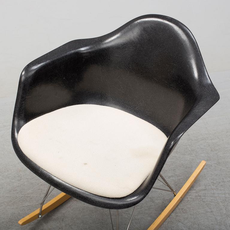A 'Rocket chair' by Charles & Ray Eames, Herman Miller, late 20th century.