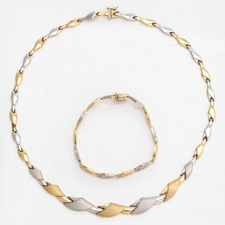 A 14K gold necklace and bracelet.