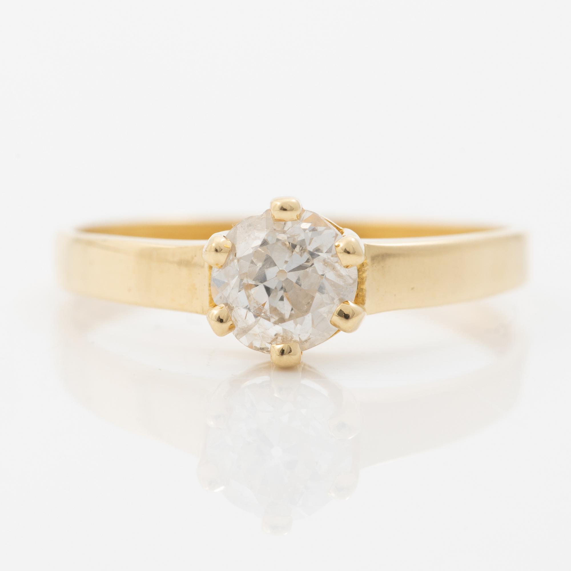 18K gold ring with an old-cut diamond.